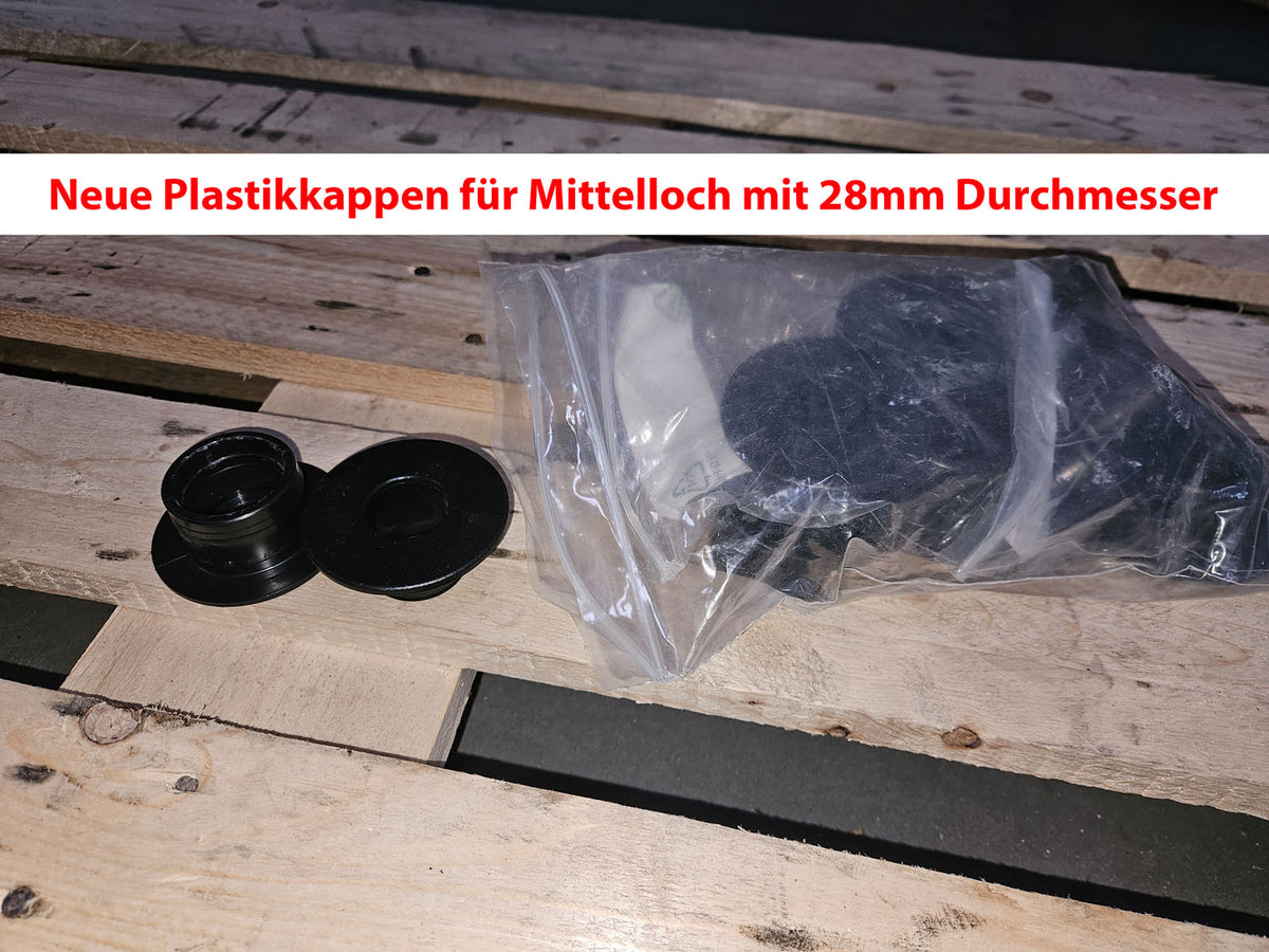 Technogym various weight plates, 230 kg total, 28 mm diameter, cast with rubber outer, 2.5 kg - 5 kg - 10 kg and 20 kg plates, used with signs of wear