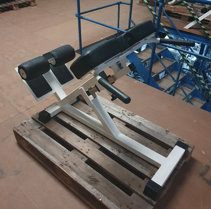 Back extension bench, hyperextension 45 degrees, frame white, upholstery black, used - refurbished condition