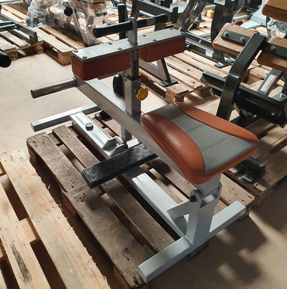 Sportsart calf machine plate loaded, seated calf raise, frame color silver, upholstery color orange, used - refurbished condition
