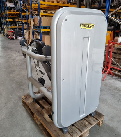 TechnoGym Biceps Machine, Arm Curl, Element Line, frame color silver, upholstery color dove blue, used - refurbished condition