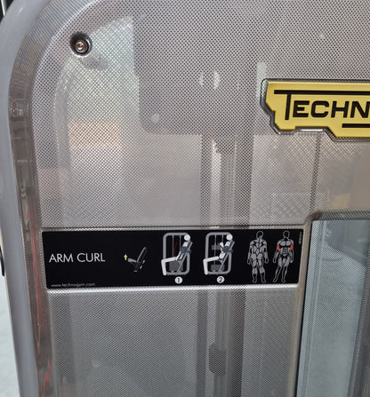 TechnoGym Biceps Machine, Arm Curl, Element Line, frame color silver, upholstery color dove blue, used - refurbished condition