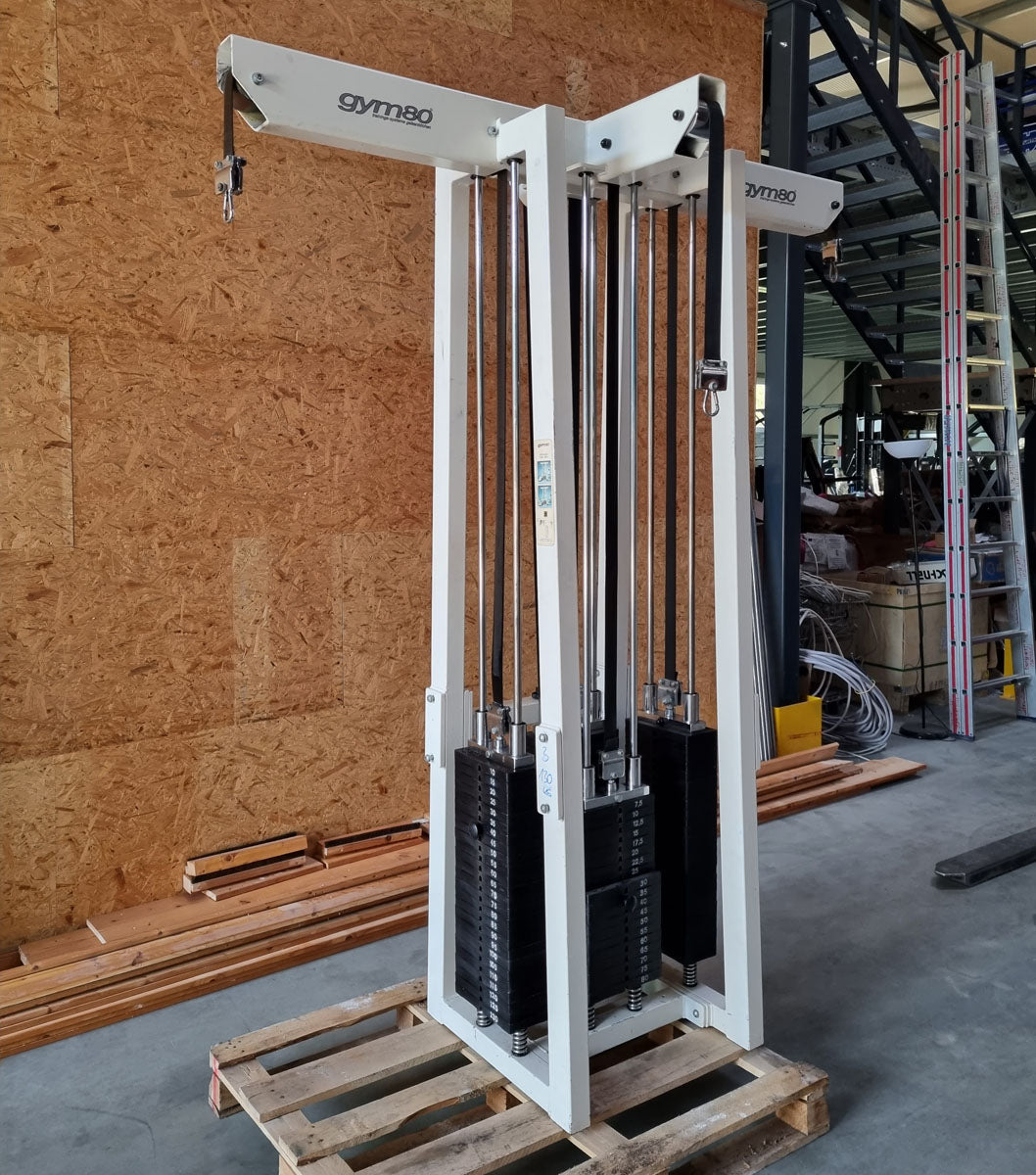 Gym80 - 4-station tower with belt, 4-stack multi-station, large weight blocks, frame color white, upholstery color turquoise, used - refurbished condition
