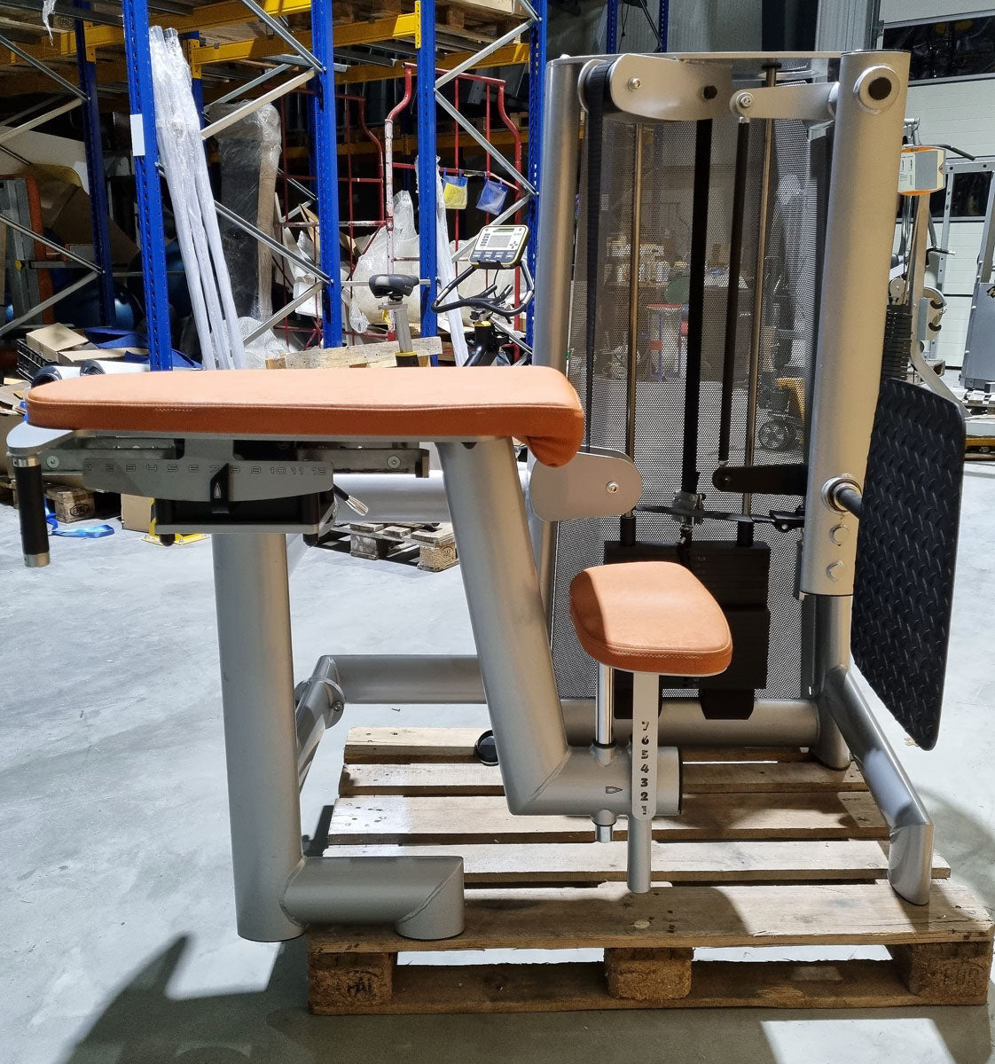Gym80 Gluteus Kick Kneeling 3004 Sygnum, butt machine, frame color silver, upholstery color orange, used - refurbished condition