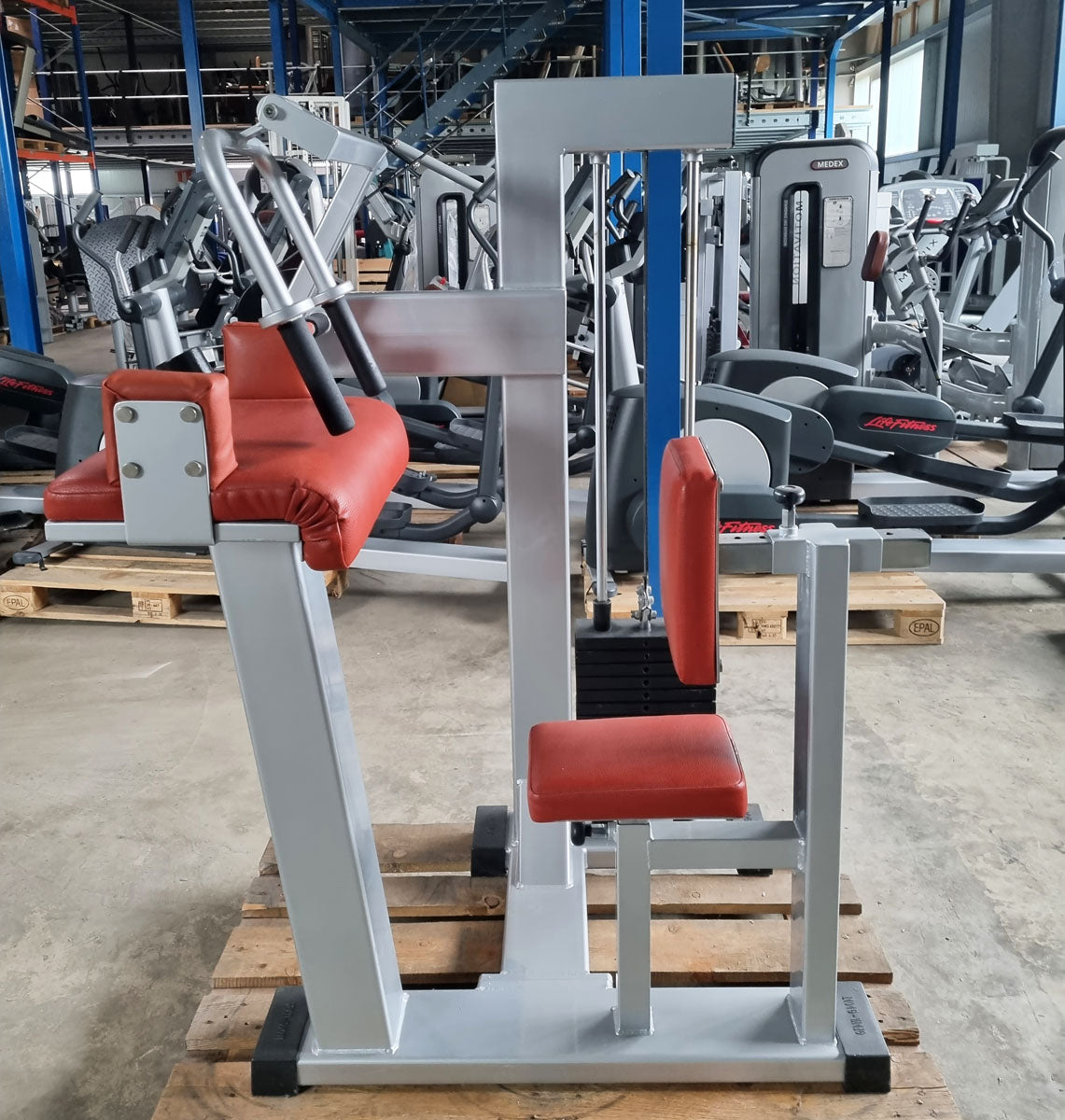 Gerva Trizepsmaschine horizontal, Triceps Extension, Rahmenfarbe Silber, Polsterfarbe Orange, gebraucht - geprüfter Zustand