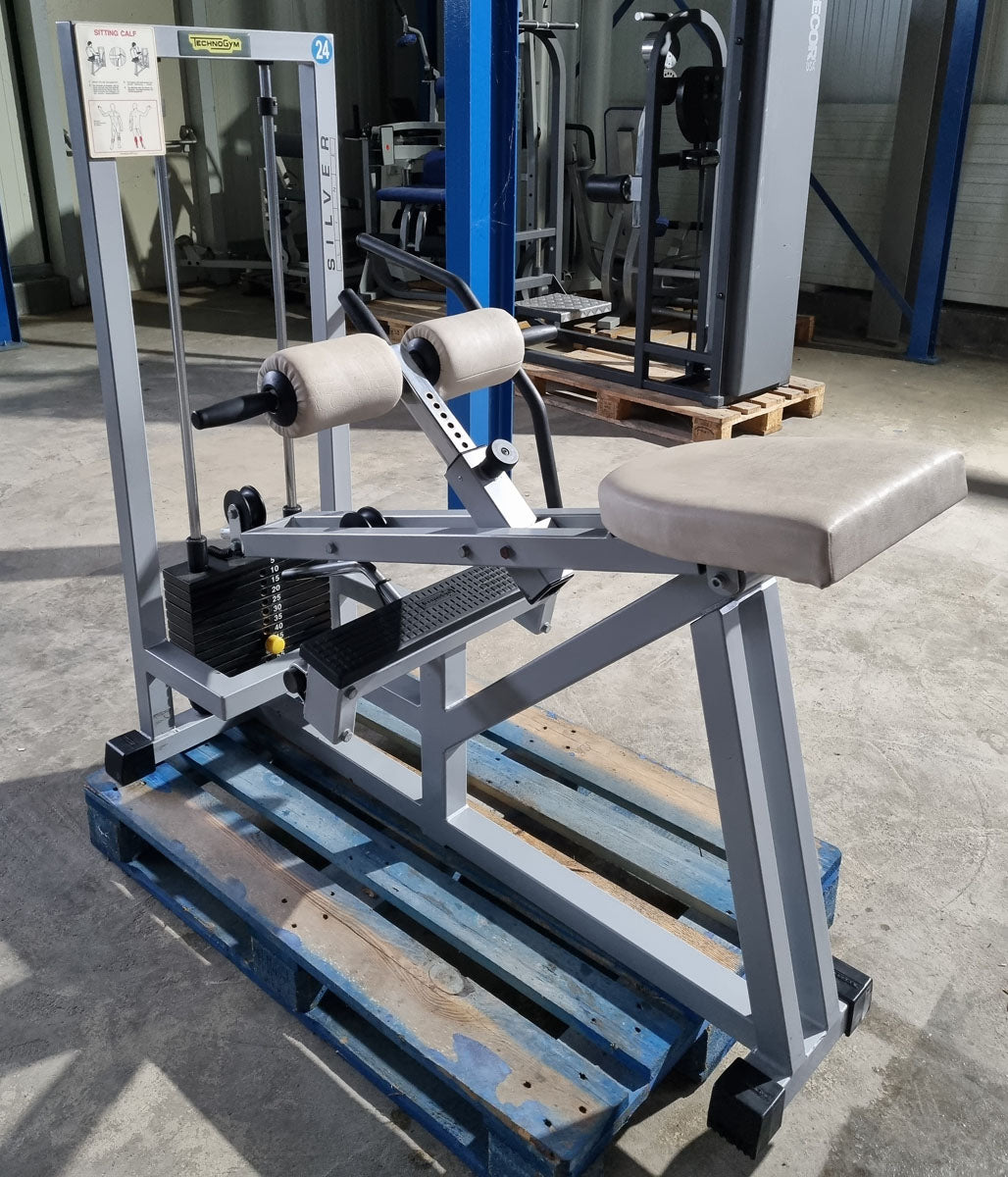 Technogym Seated Calf Sitting Wadenmaschine sitzend, Sitting Calf, Silverline, Oldschool, Rahmenfarbe Silber, gebraucht mit Gebrauchsspuren