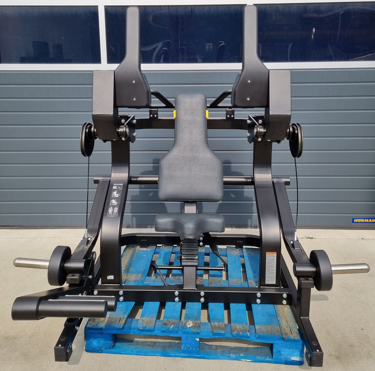 Technogym Pure Pullover, Pull-up machine Plate loaded, Pure Strength Series disc holder, frame color black, used - refurbished condition