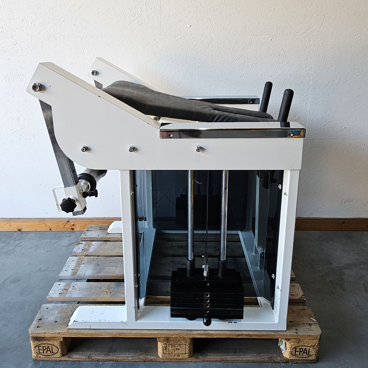 Bruns buttock machine, standing glute machine, glute isolator raise, old school bodybuilding strength machine, white frame, used with signs of wear