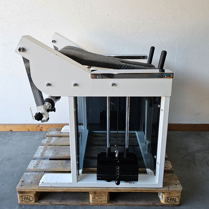 Bruns buttock machine, standing glute machine, glute isolator raise, old school bodybuilding strength machine, white frame, used with signs of wear