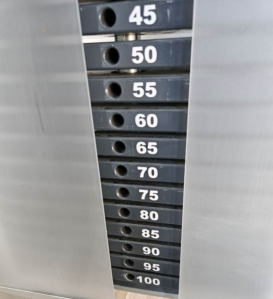 Proxowell or Proxomed bench press machine, chest press, 100kg weight block, Compass or C-Well series, frame color silver, used - refurbished condition