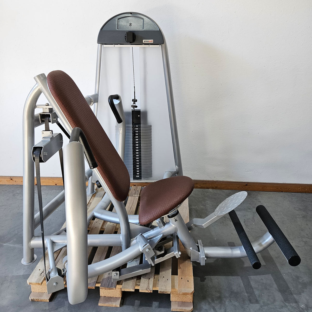 Proxowell or Proxomed bench press machine, chest press, 100kg weight block, Compass or C-Well series, frame color silver, used - refurbished condition