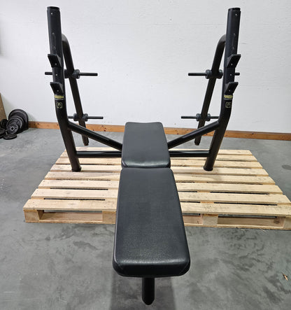 Technogym Horizontal Bench, Olympic Flat Bench, Flat Bench with Shelf, Olympic Flat Press Bench, With 30mm Disc Holder, Frame Color Black, Used - Refurbished Condition