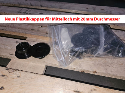 Technogym various weight plates, 230 kg total, 28 mm diameter, cast with rubber outer, 2.5 kg - 5 kg - 10 kg and 20 kg plates, used with signs of wear