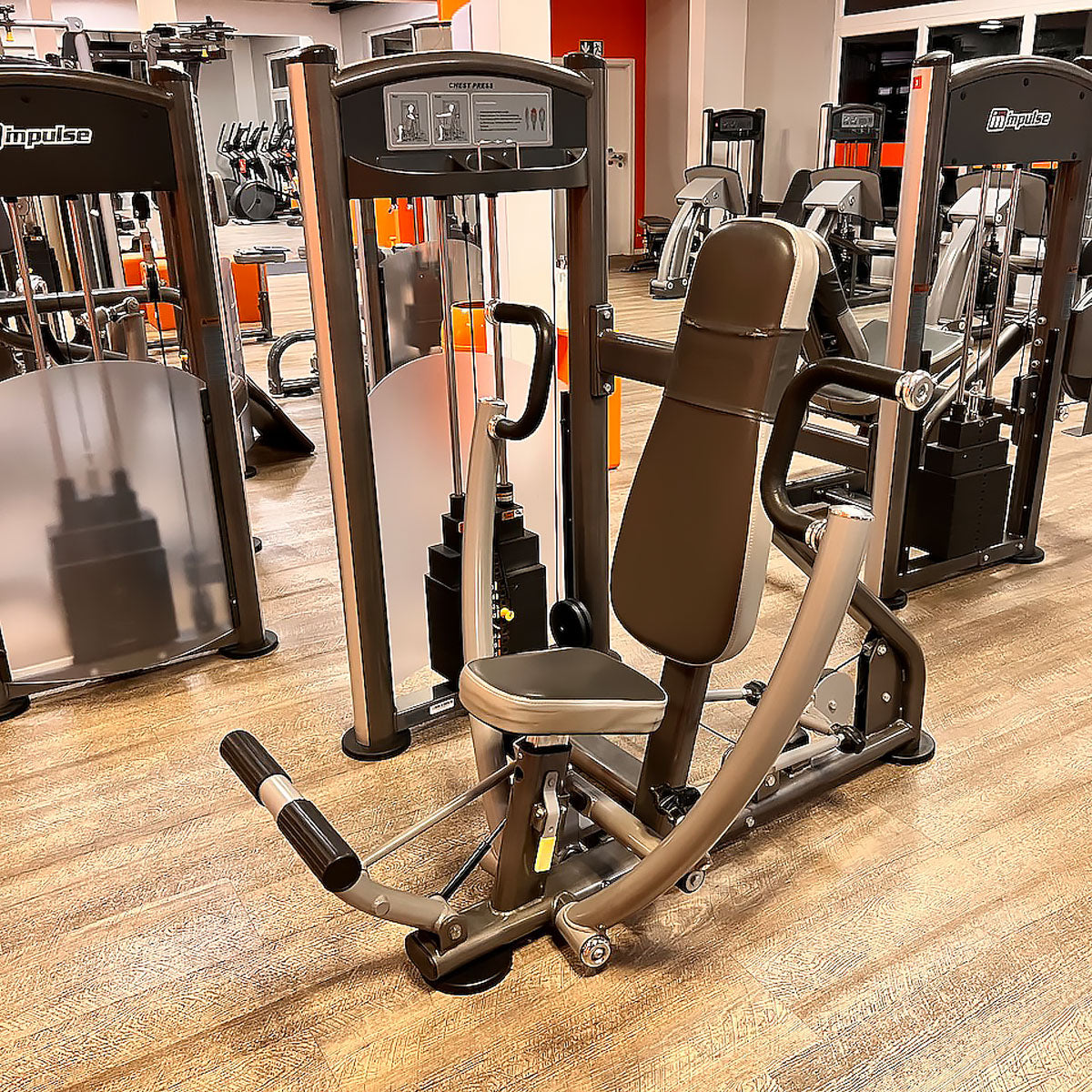 Impulse Fitness bench press machine, chest press, frame color gray-anthracite, used - refurbished condition