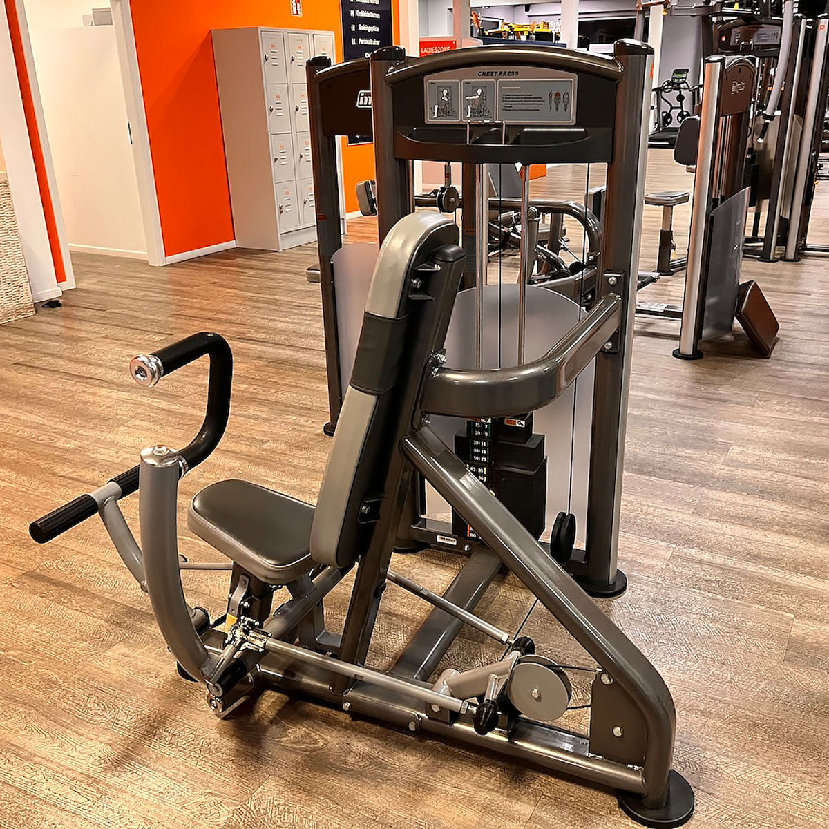 Impulse Fitness bench press machine, chest press, frame color gray-anthracite, used - refurbished condition