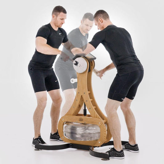 Person trainiert mit NOHrD Fitnessgerät im Studio.